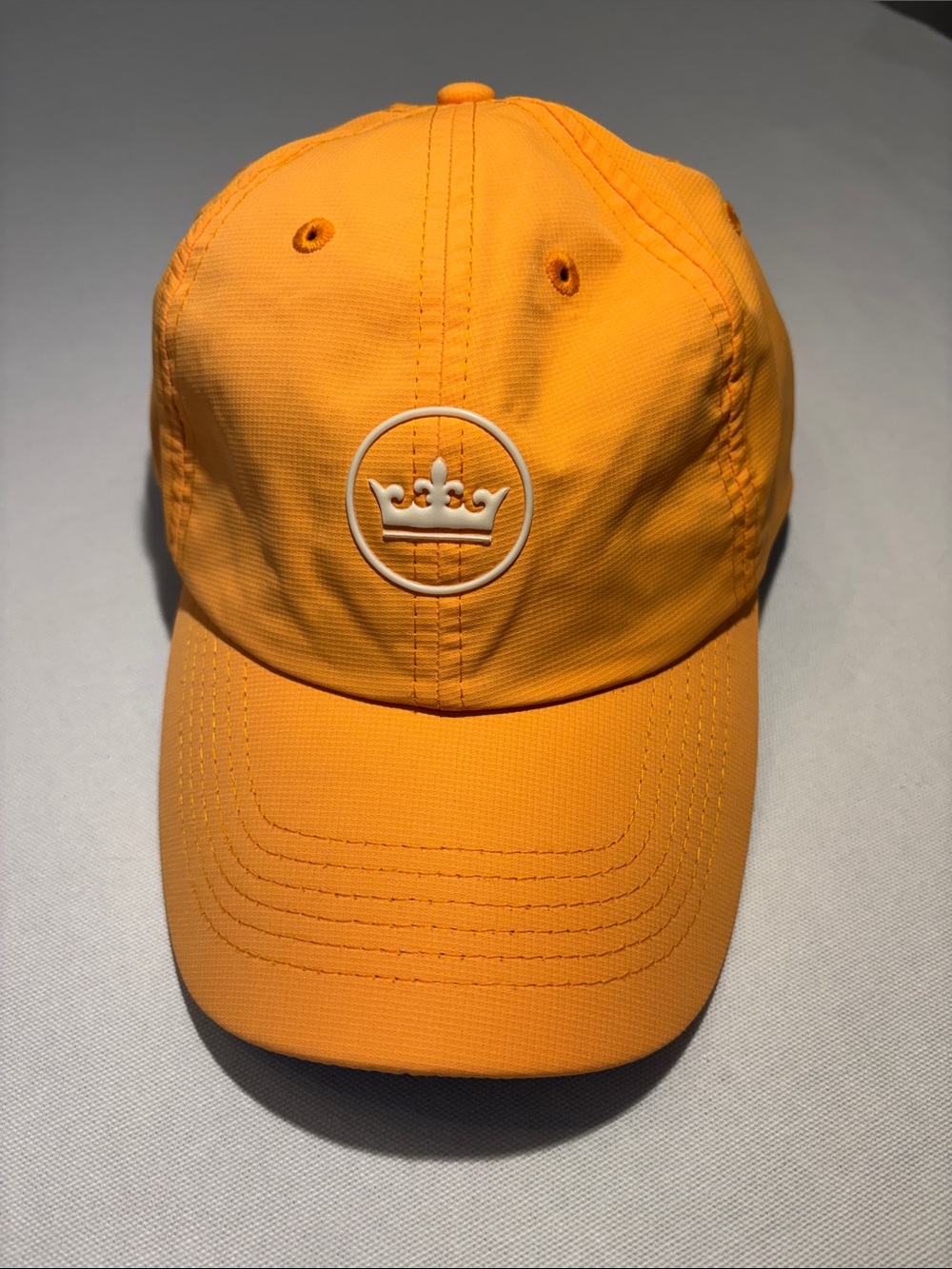 Peter Millar White Crown Logo vibrant Orange Adjustable Performance Hat.